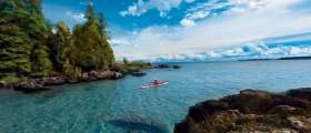 Man kayaking on lake